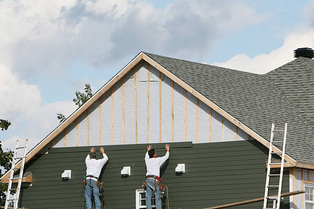 Professional Siding Replacement technician working in Mount Airy, GA